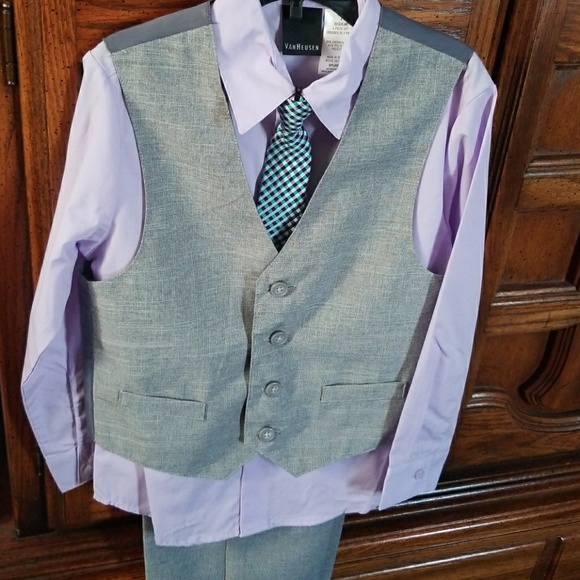 light purple shirt with grey pants